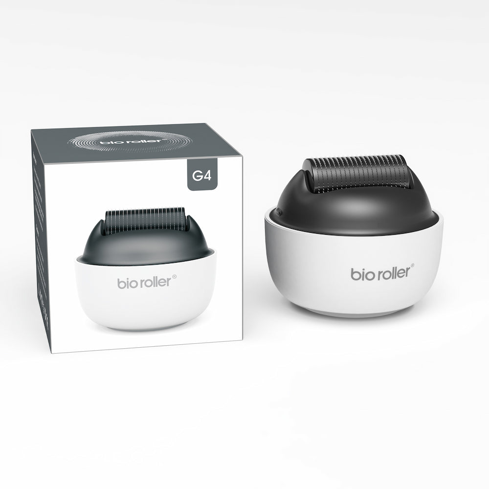 Bio Roller G4 microneedling-Rolle zusammen mit der Produktverpackung, entworfen für Gesichtsbehandlungen, Hautverjüngung und verbesserte Serumaufnahme.